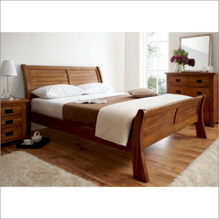 Modern High Rise Wooden Bed Design via TradeIndia