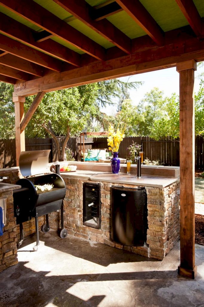 Outdoor Kitchen and Bar With Smoker, Fridge and Wine