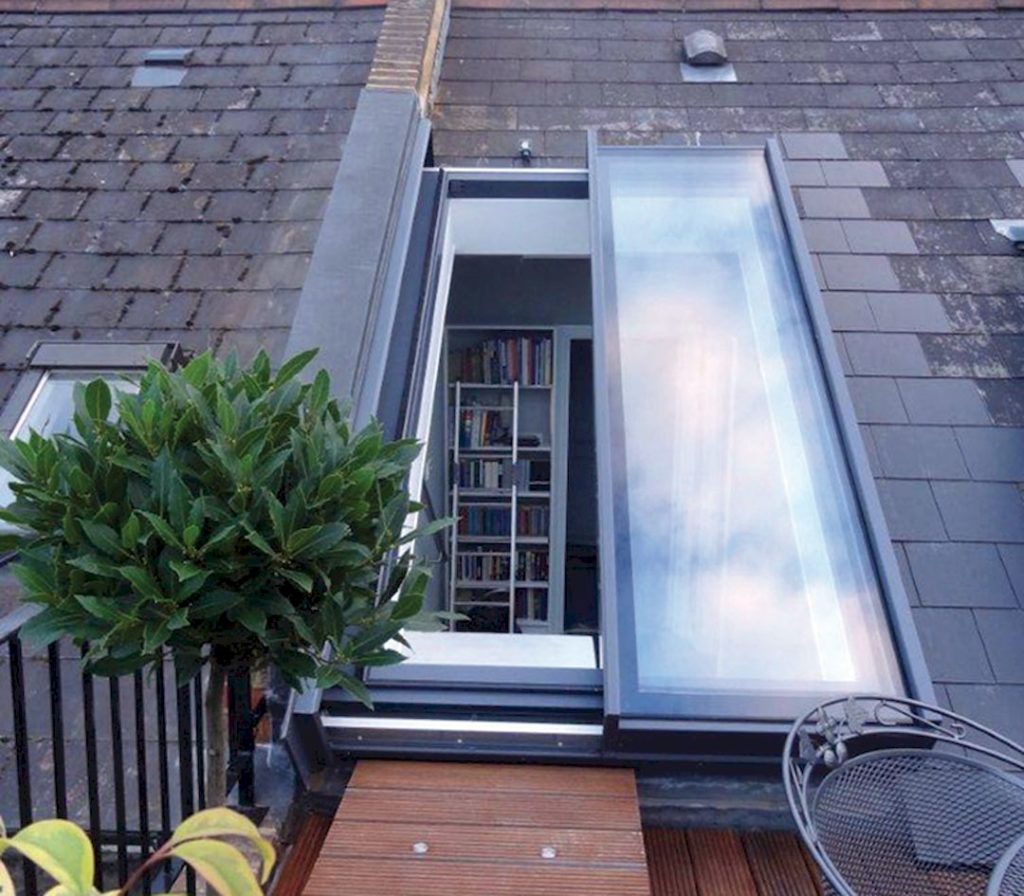 Bespoke sliding over fixed rooflight for sloped roofs via glazingvision
